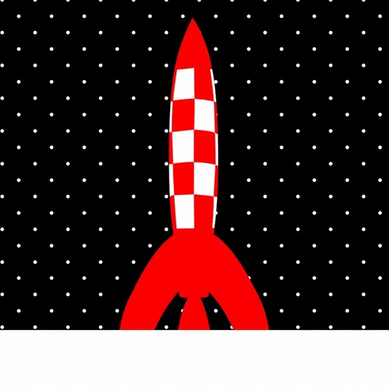 A red and white space rocket in the snow
